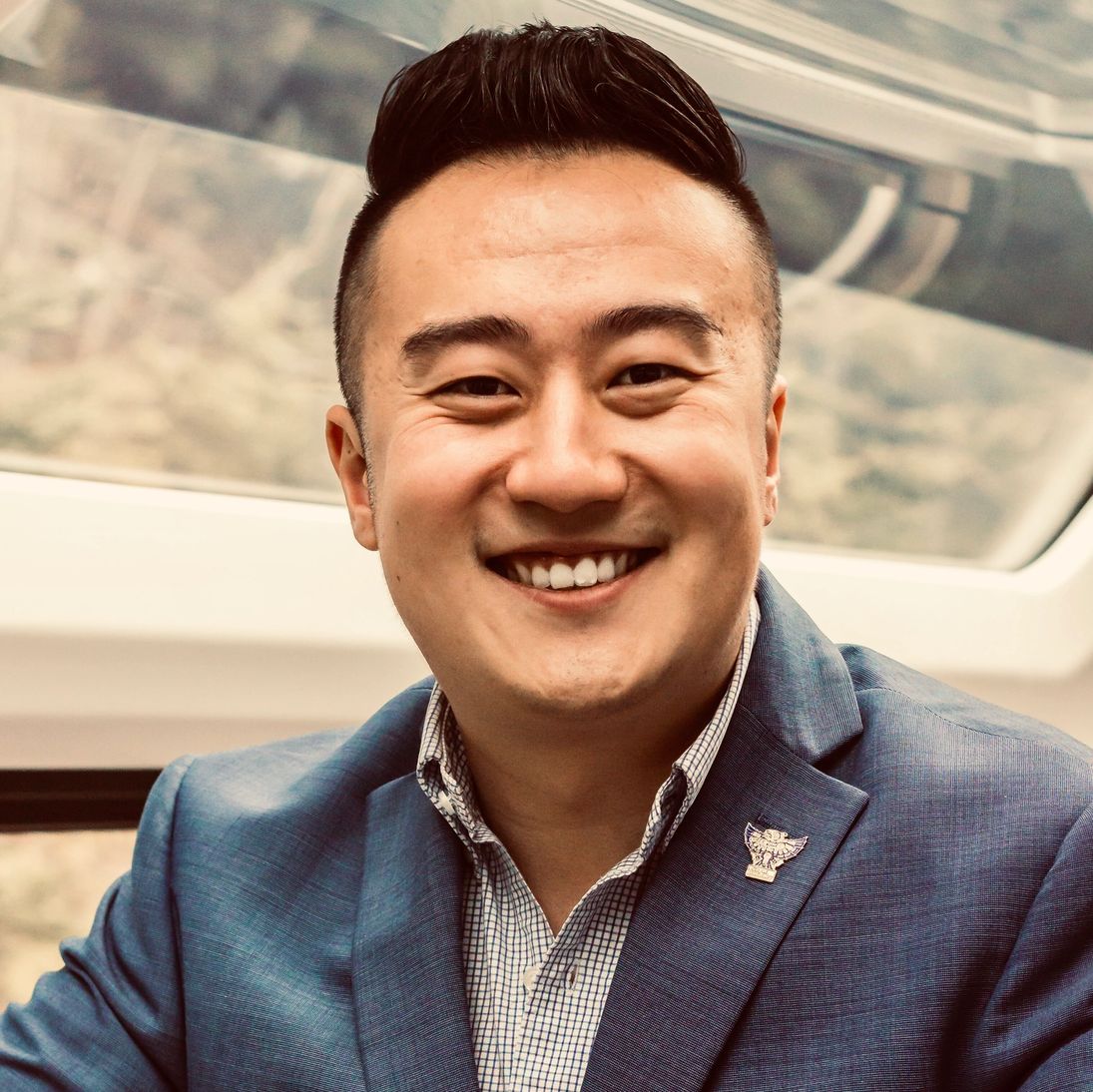 Portrait of Tong Guan, Principal Consultant at TGX